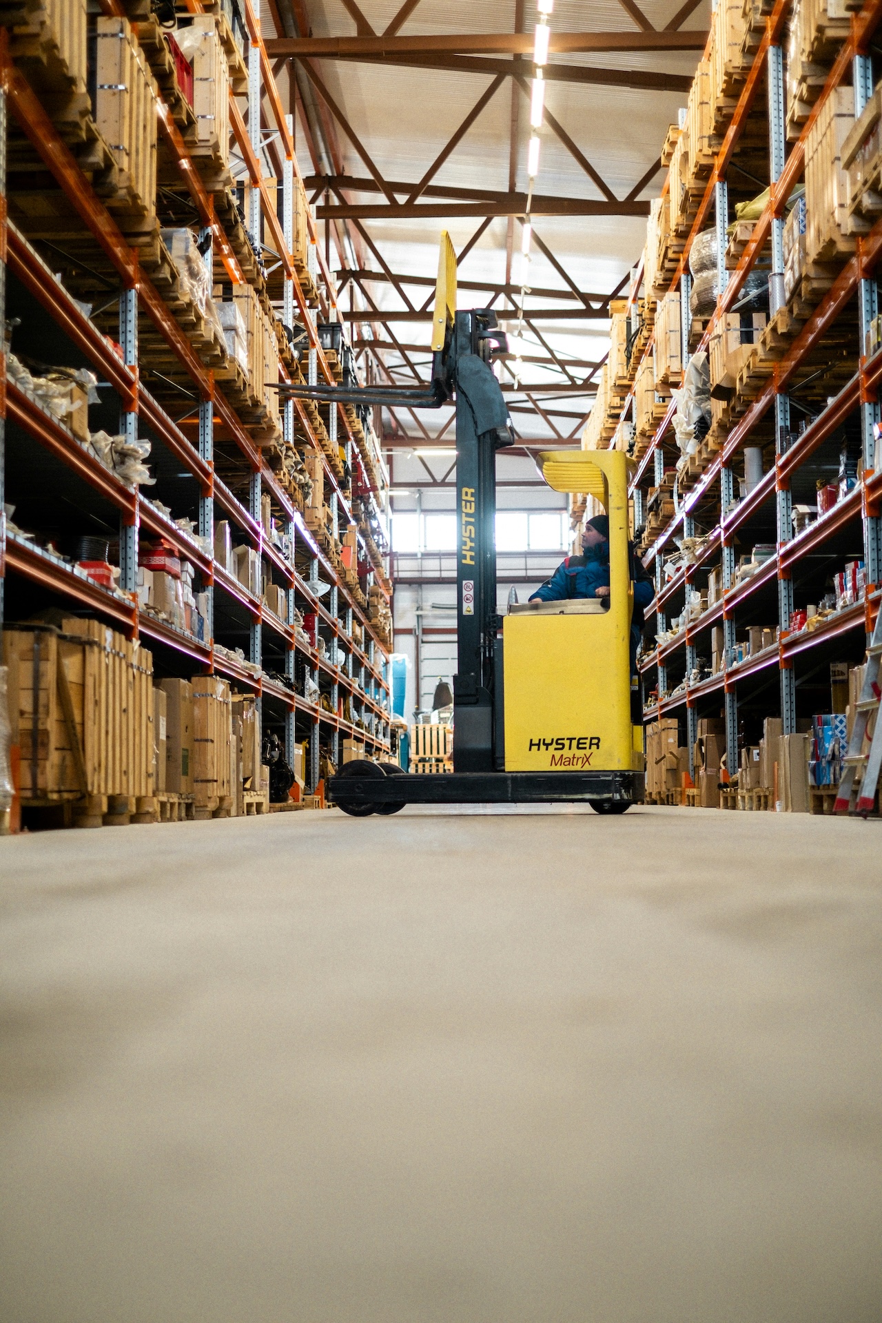 Reach truck in a parts warehouse